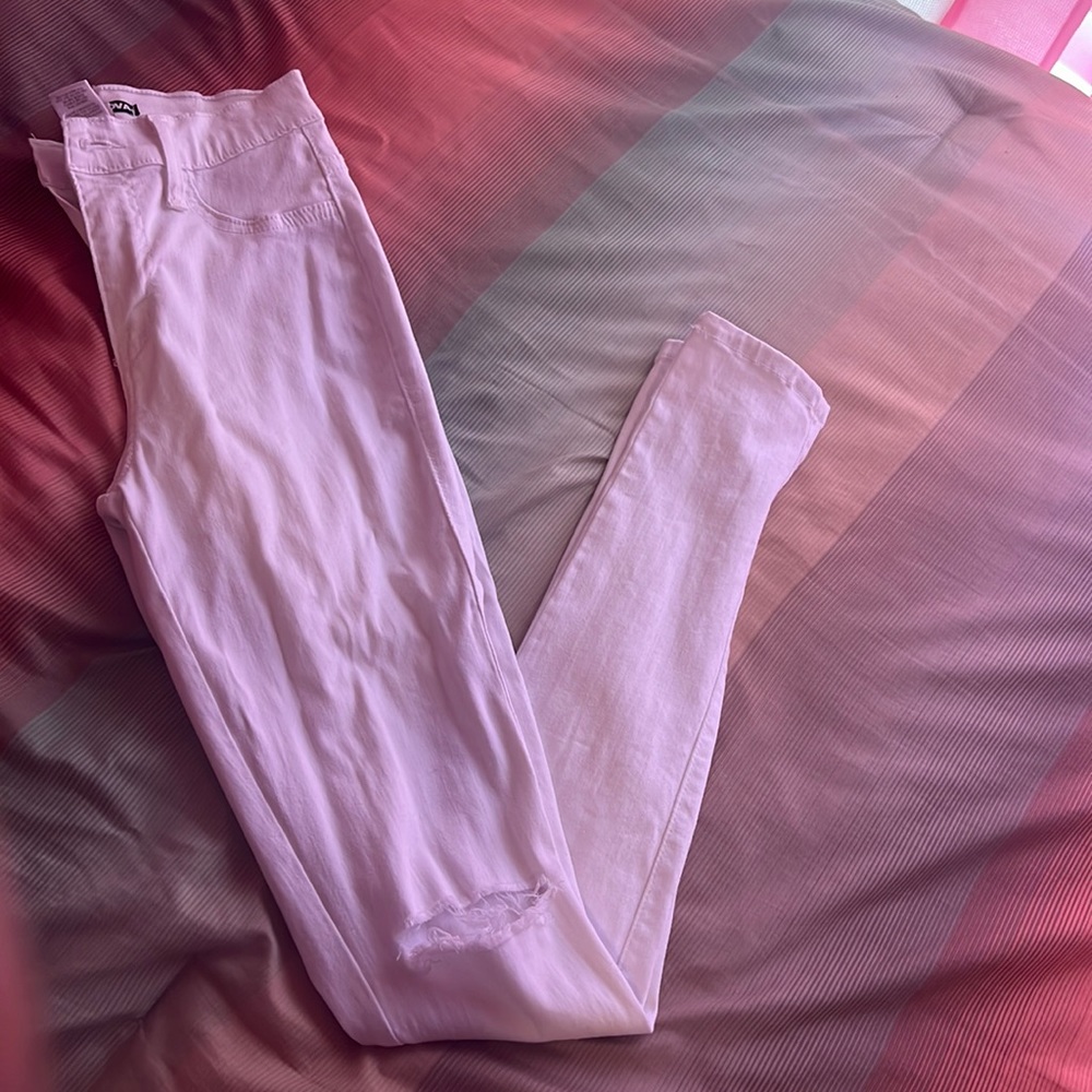 I am selling white fashion nova jeans very stretchy and fitted only worn once.